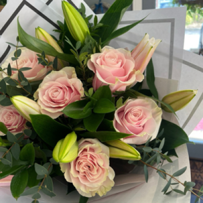 Pink rose and lily bouquet - The simplicity and elegance of roses and Lillie’s makes it a great combo. With fresh foliage