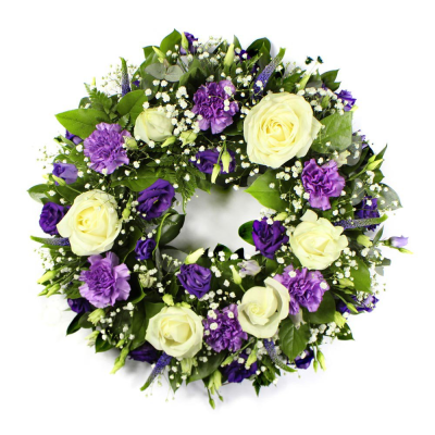 Purple and cream wreath - Mixture of seasonal flowers in a cream and purple palette with mixed foliage.